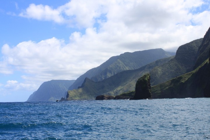 a large body of water with Molokai in the background