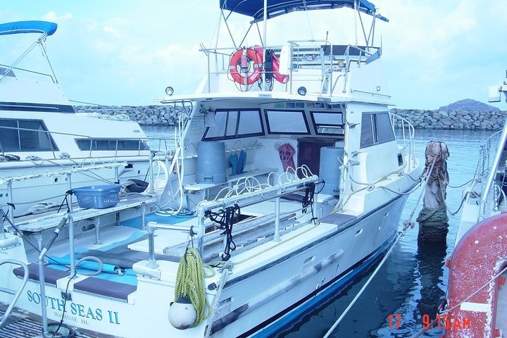 a boat docked at a dock